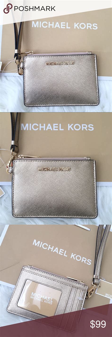 michael kors coin wristlet|Michael Kors pale gold handbags.